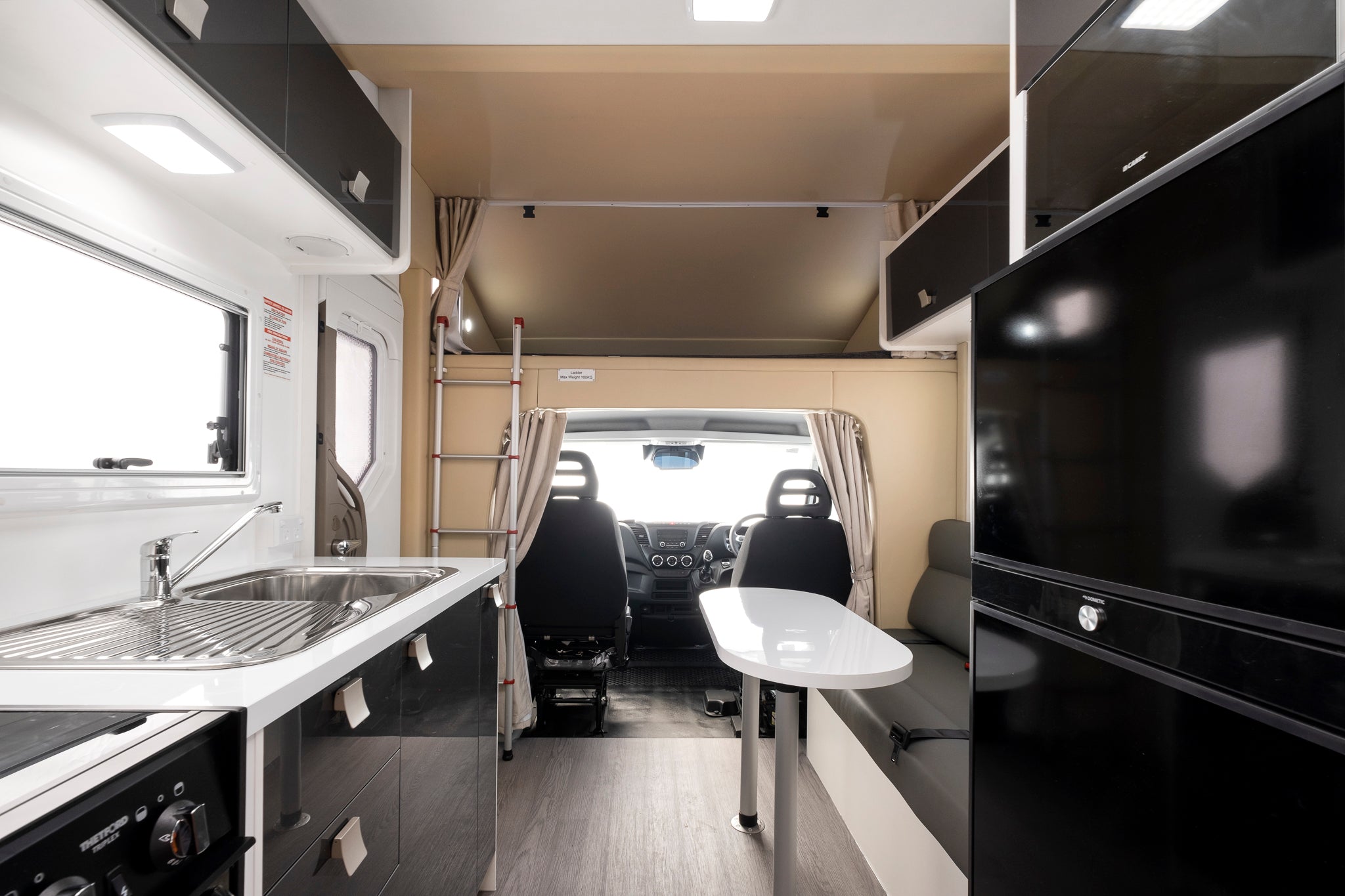 Winnebago Coogee motorhome metallic grey palette A interior view from back